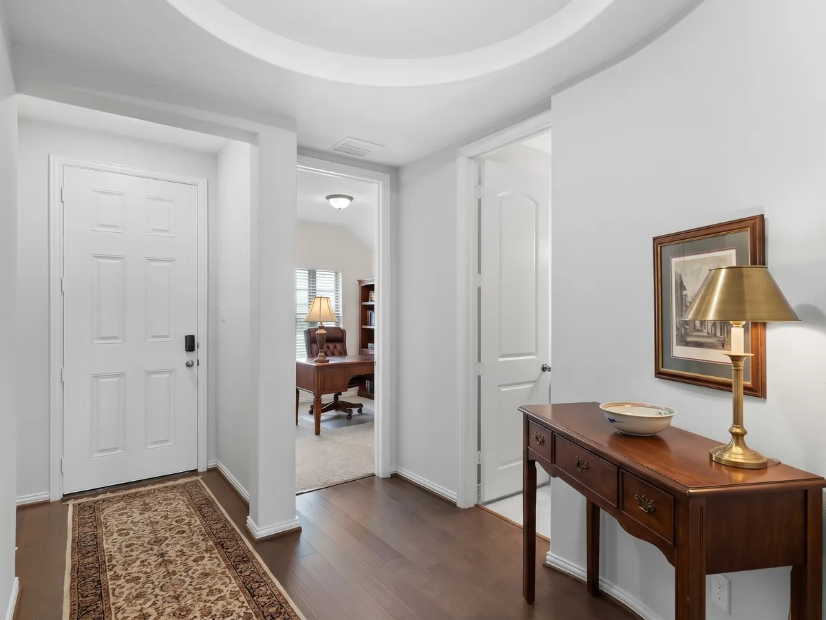 Traditional virtual staging style — entry hall, staged by AI